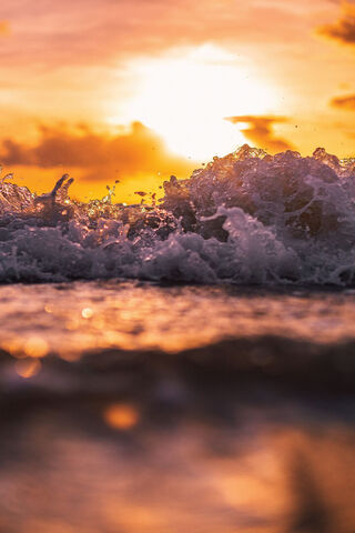 Sunset Symphony: The Dance of Waves 🌅🌊