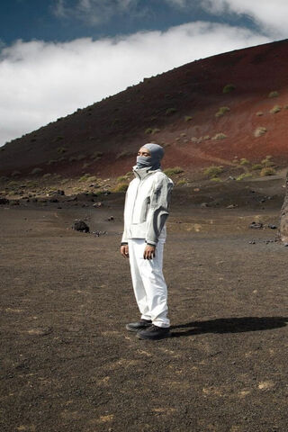 Futuristic Explorer in a Volcanic Landscape 🌋✨