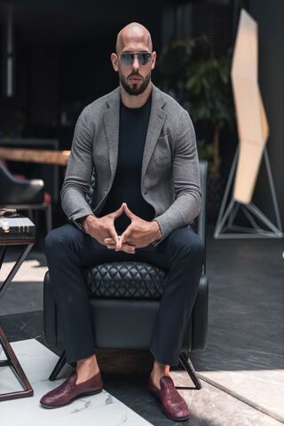 Stylish Confidence in a Modern Setting 🕶️✨