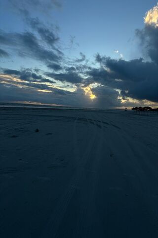 Serene Sunset at the Be..