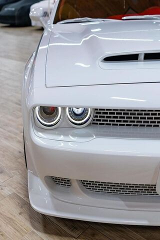Sleek White Muscle Car ..