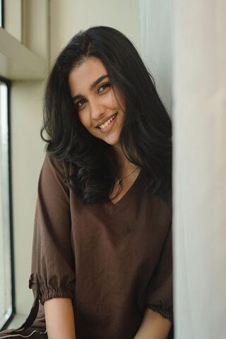 Radiant Smile by the Wi..