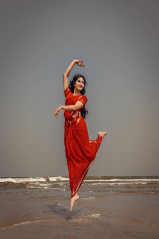 Graceful Dance by the Shore 🌊💃