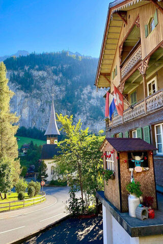 Charming Swiss Village Scene 🇨🇭🏔️
