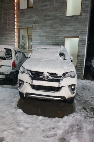 Winter Wonderland: Snow-Covered SUV ❄️🚗