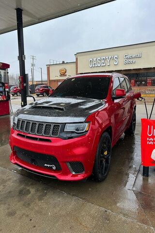 Bold Red SUV at the Pump 🚗💨