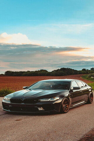 Sleek Black Beauty on the Open Road 🚗✨