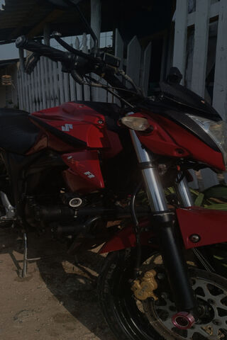 Sleek Red Motorcycle Ready to Ride! 🏍️❤️