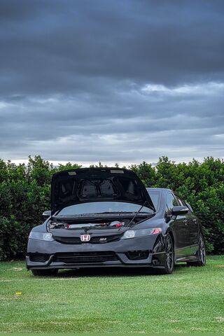 Sleek Black Honda Civic..
