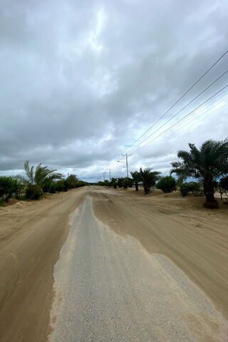 Dusty Road Under Cloudy..