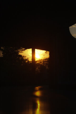 Golden Sunset Reflectio..