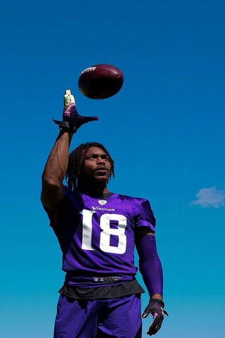 Catching Dreams: A Football Star in Action 🏈✨