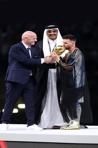A Historic Moment: Messi Lifts the World Cup Trophy! 🏆✨