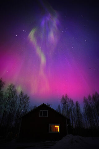 Magical Aurora Over a C..