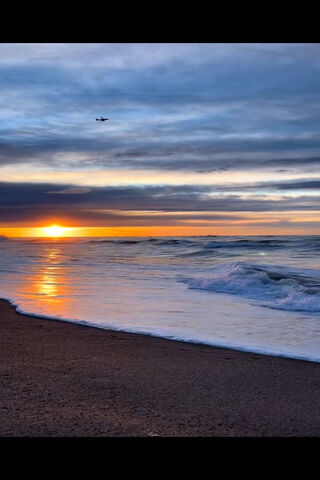 Serene Sunset Over the ..