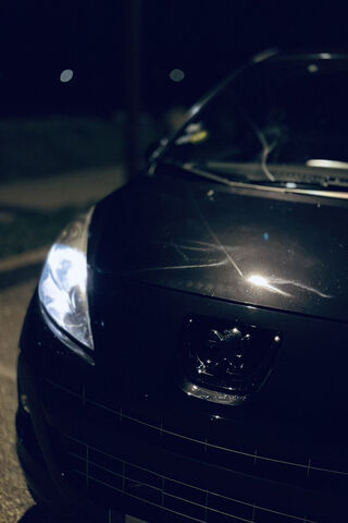 Nighttime Shine: The Black Beauty 🚗✨