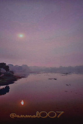 Serene Sunset Reflectio..