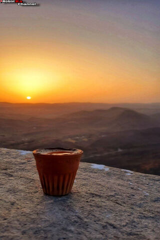 Sunset Serenity with a Cup of Joy 🌅☕