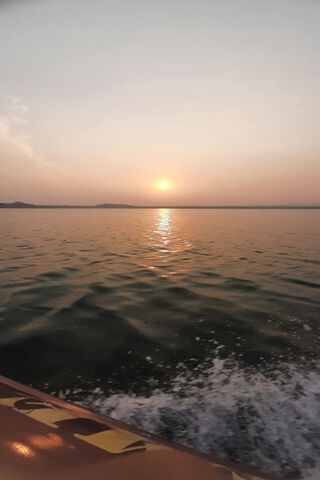 Serene Sunset Over Calm..