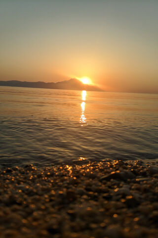 Sarti: A Serene Sunset ..