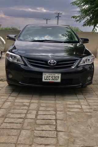 Sleek Black Toyota Seda..