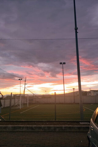 Sunset Over the Soccer ..