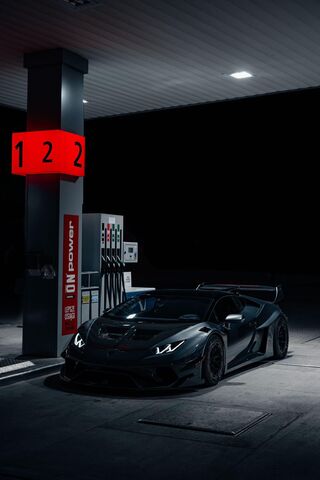 Nighttime Power: The Dark Beast at the Pump 🏎️🌌