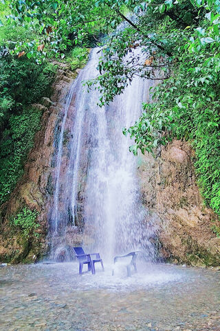 Serene Waterfall Retrea..
