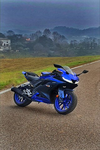 Sleek Blue Motorcycle o..