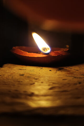 Illuminating Serenity: The Mud Dip Candle