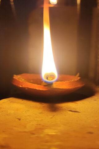 Illuminating Serenity: A Flickering Flame 🕯️✨