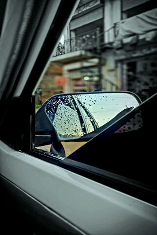 Raindrops on the Rearview 🌧️🚗