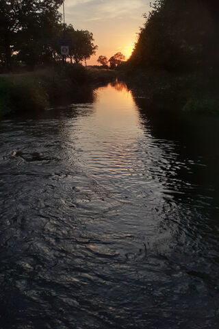 Serene Sunset Over the ..