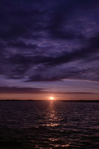 Serene Sunset Over the ..