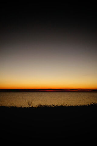 Serene Sunset Over the ..