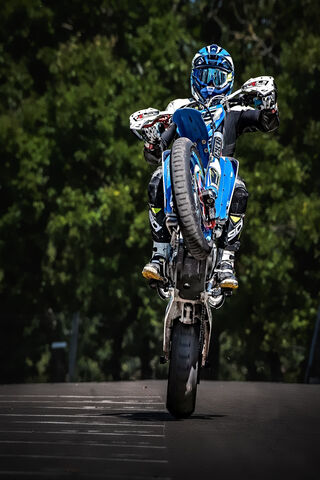 Thrilling Wheelie Action! 🏍️💨