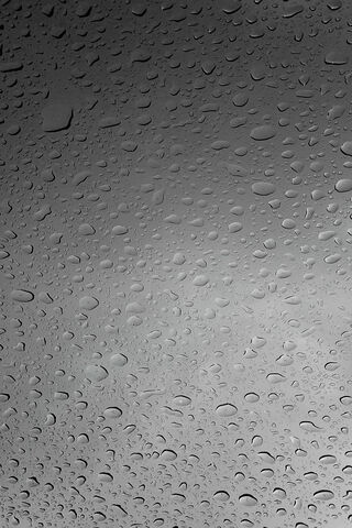 Nature's Art: Raindrops on Glass