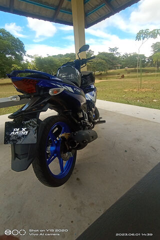 Sleek Blue Motorcycle R..