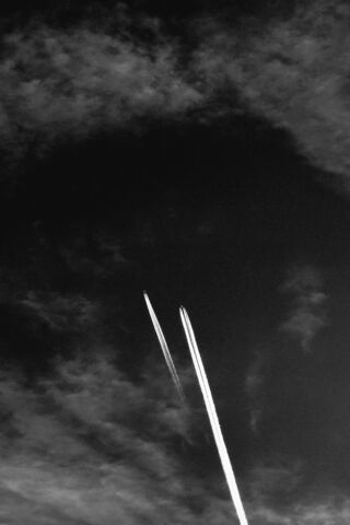 Sky Trails in Monochrome 🌌✈️