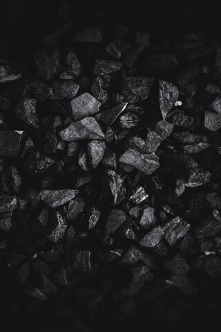 Dark Elegance: A Close-Up of Black Stones