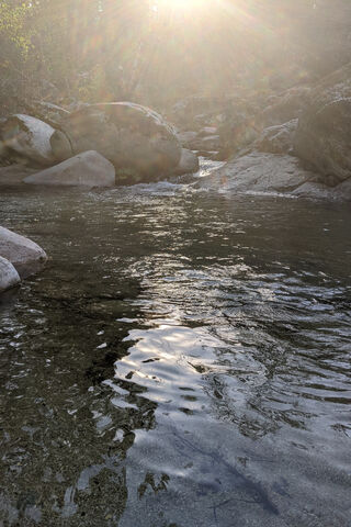 Serene Stream at Sunset 🌅💧