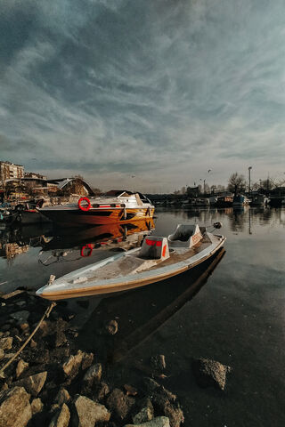 Tranquil Waters: A Boat..