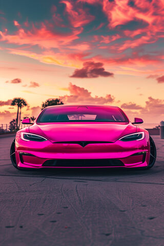 Stunning Pink Tesla Under a Colorful Sunset 🌅🚗