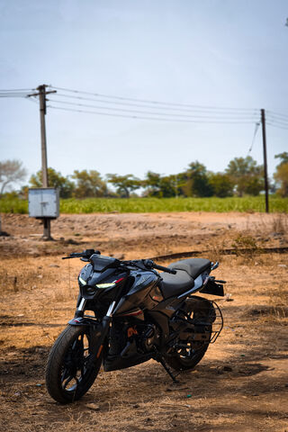 Sleek Ride in the Open Fields 🏍️🌾