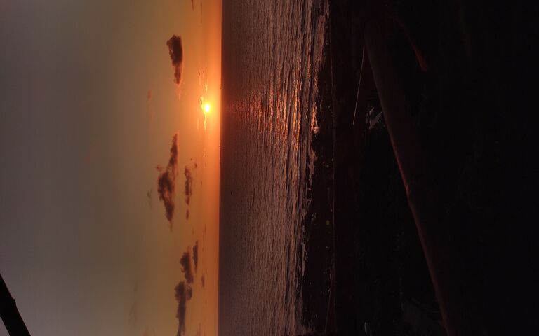 Serene Sunset Over the ..