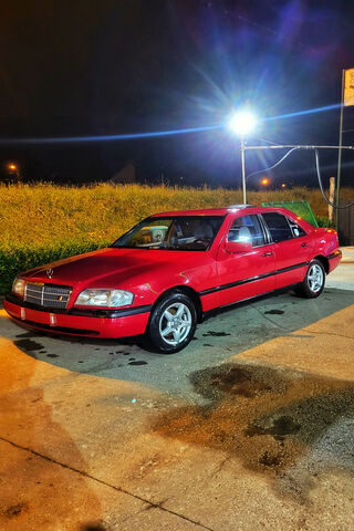 Classic Red Beauty Under the Night Sky 🚗✨