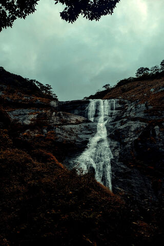 Majestic Waterfall Unde..