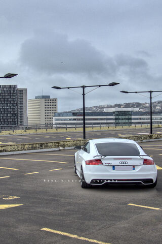 Sleek Audi TT on a Rooftop Adventure 🚗☁️