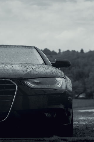 Sleek Elegance in the Rain 🌧️🚗