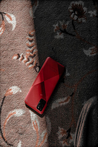 Vibrant Red Phone on Co..